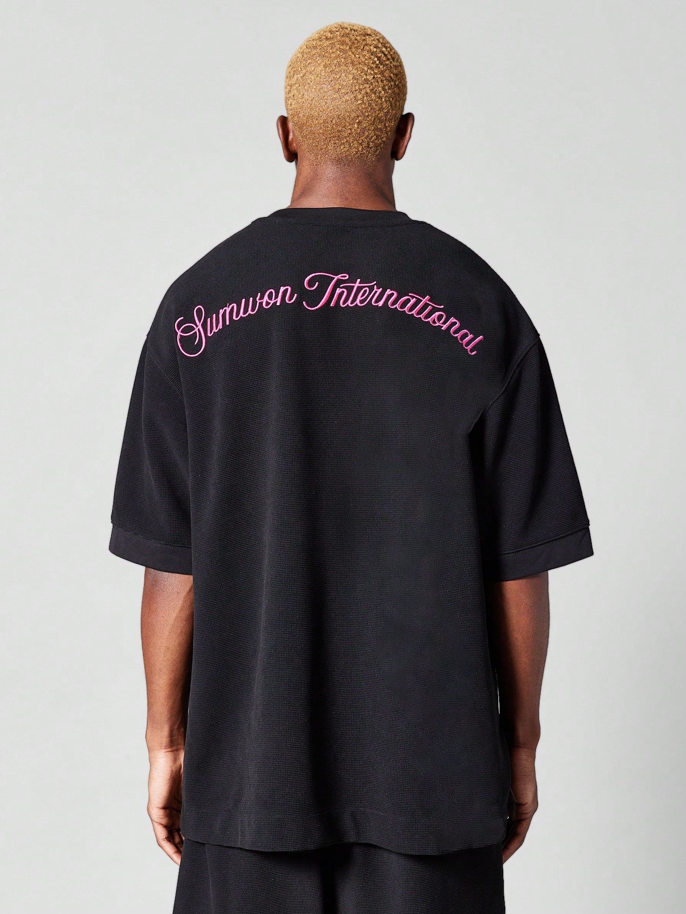 Oversized Fit Textured Tee With Back Embroidery
