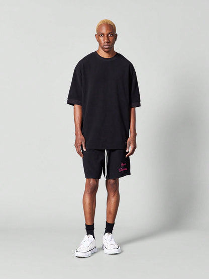 Oversized Fit Textured Tee With Back Embroidery
