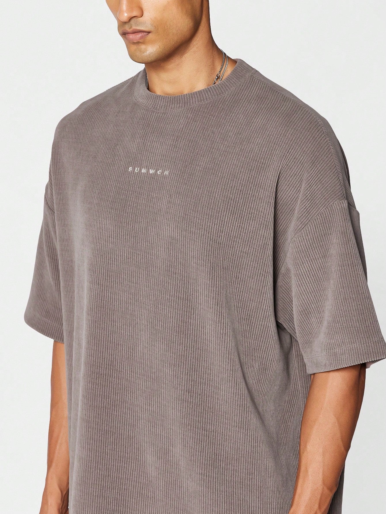 Textured Mock Neck Tee With Front Embroidery